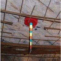 tell-tale instrument installed in roof of underground mine with additional rebar and metal strap support
